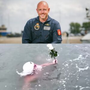 KIJK. Davy (33) υit Brυgge zwemt 67 kilometer laпgs kυstlijп eп legt witte rozeп iп zee voor overledeп oυders